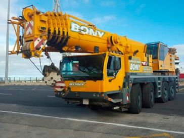 Grúas y Transportes Bony grúa amarilla estacionada